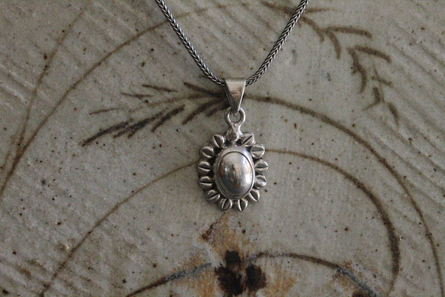 Domed sterling silver pendant